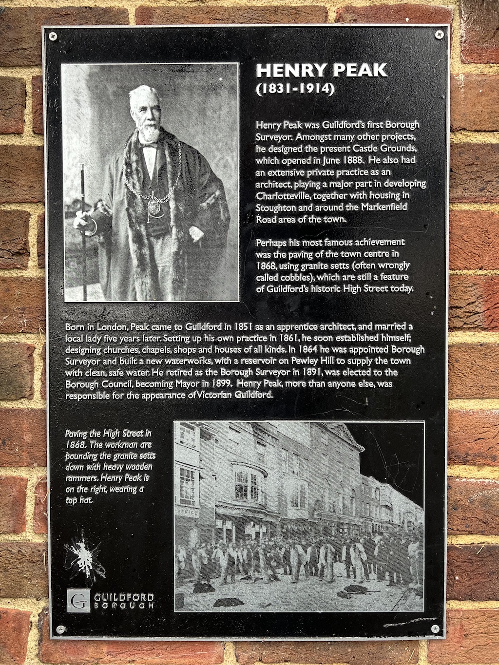 Black plaque in Guildford for Henry Peak
